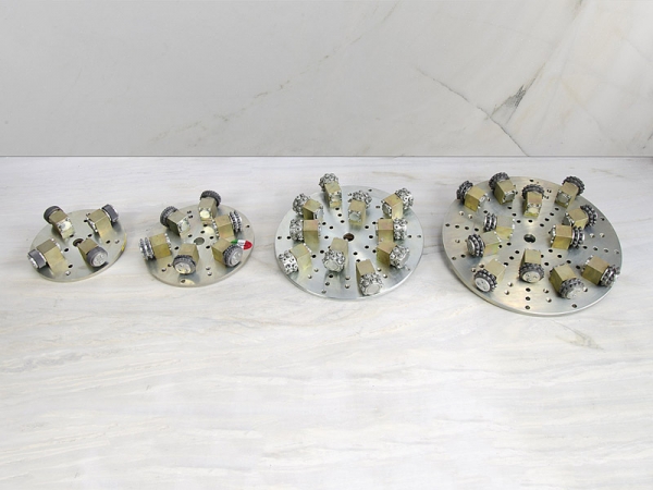 Rotary bush hammer plates